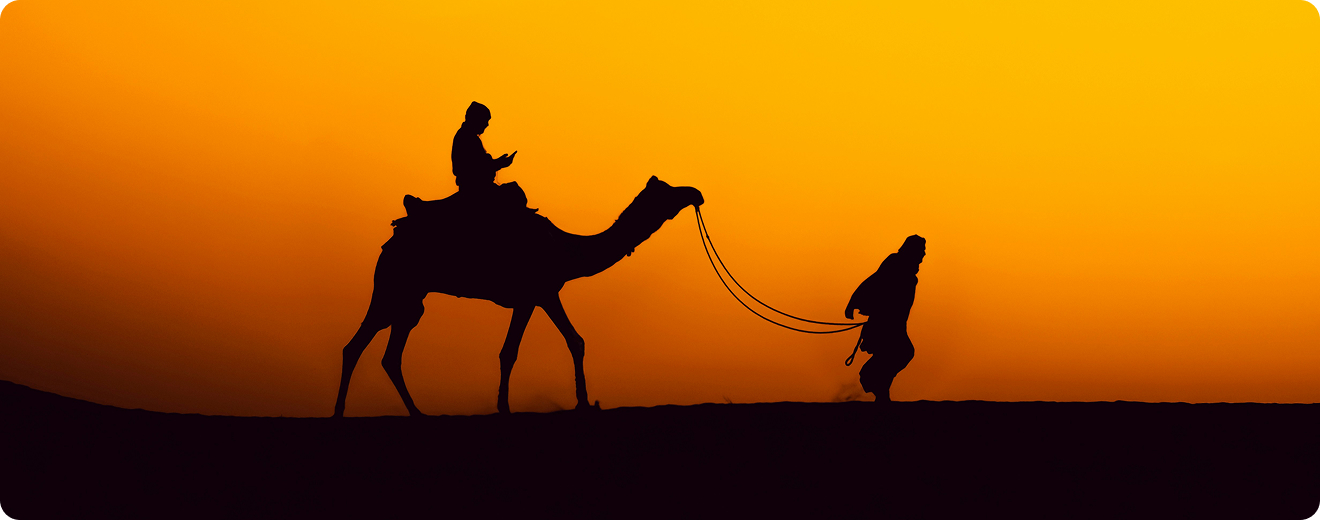 group-people-camels-desert 1